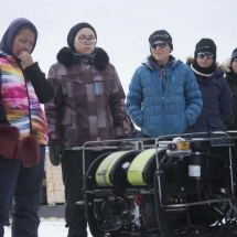 The ROV team shows the kids how this remotely commanded robot can film and collect data under the ice.